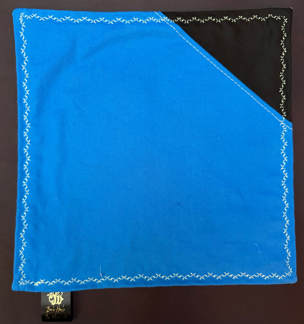 Sugar skulls with blue cotton / black microfiber backing edc hank with glow thread.