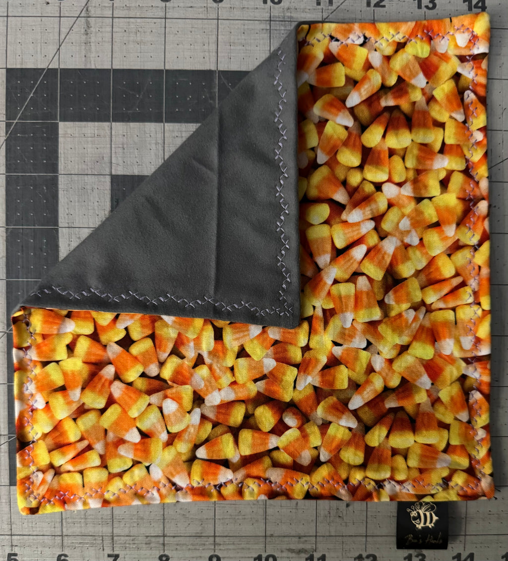 Realistic candy corn edc hank with microsuede backing and glow thread