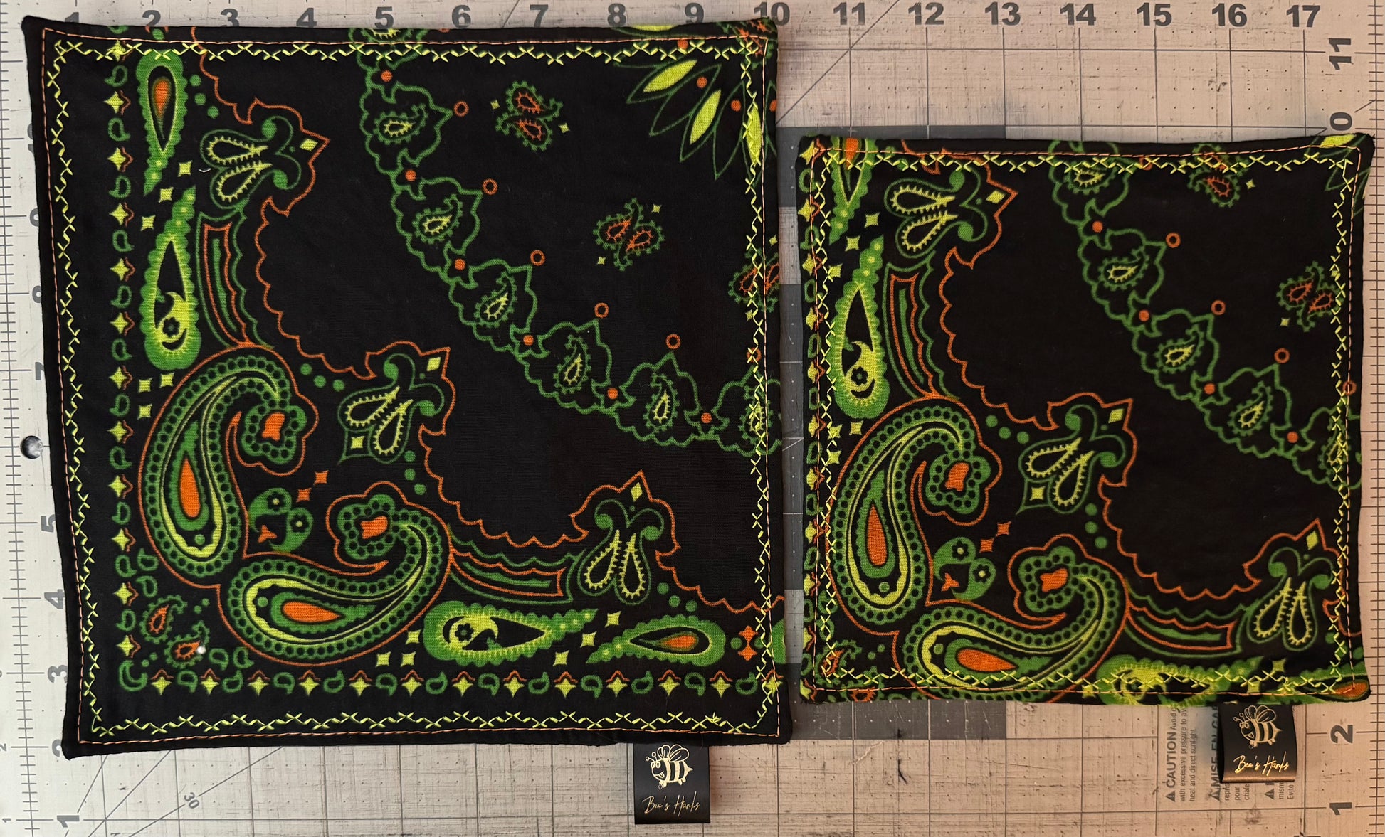 Neon green and orange paisley edc hank with glow thread.