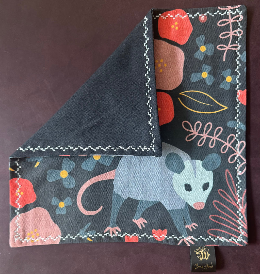 Opossum edc hank with black microsuede backing