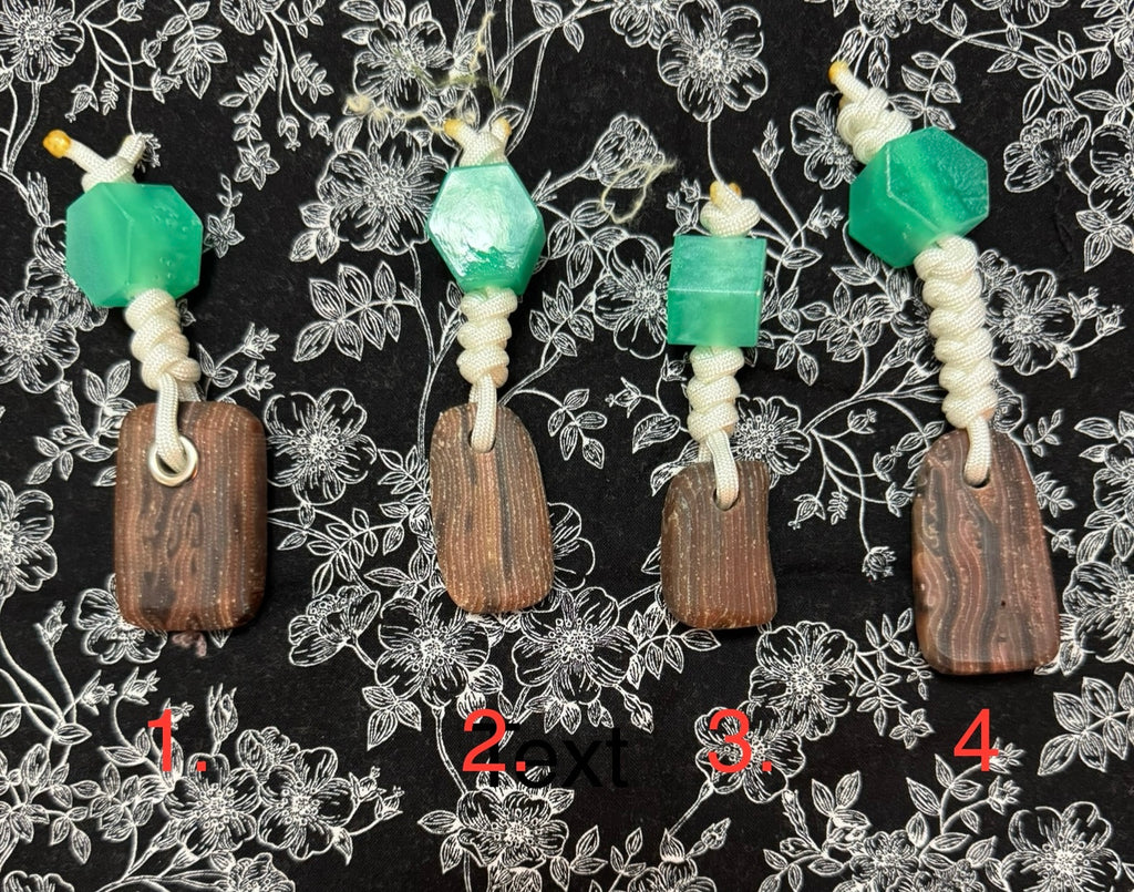 Fabric and resin composite worry stone with hex bead