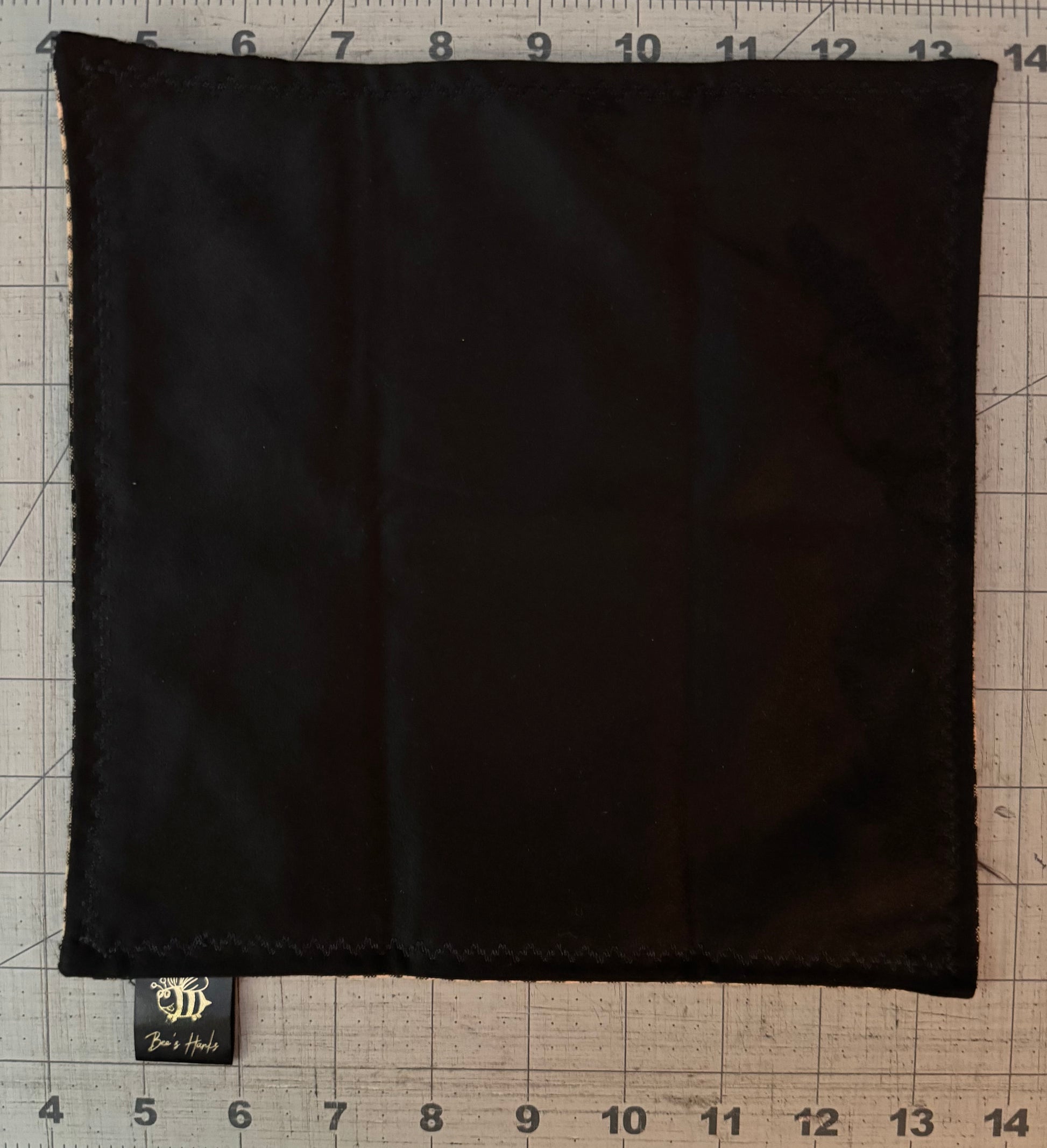 Black and tan checkered edc hank with black microsuede backing